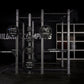 Hammer Strength HD Athletic NX Power Half Combo Rack with black weight plates and steel frame on black background