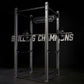 Hammer Strength HD athletic power rack with stainless steel frame, loaded barbell, and weight plates on black background