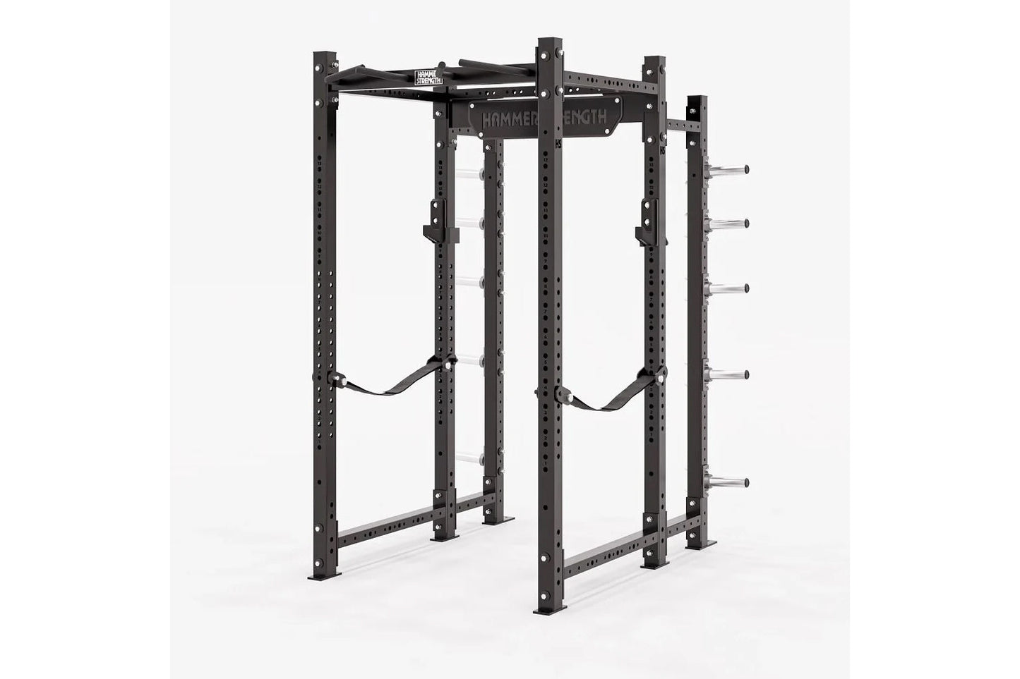 Black steel Hammer Strength power rack with multiple perforated uprights, safety bars, and weight plate pegs on white backgro
