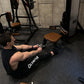 Man using black and tan Hammer Strength dual pulldown row machine in gym setting
