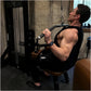 Man using black Hammer Strength HD Elite Dual Pulldown Row machine in gym setting, wearing black sleeveless top