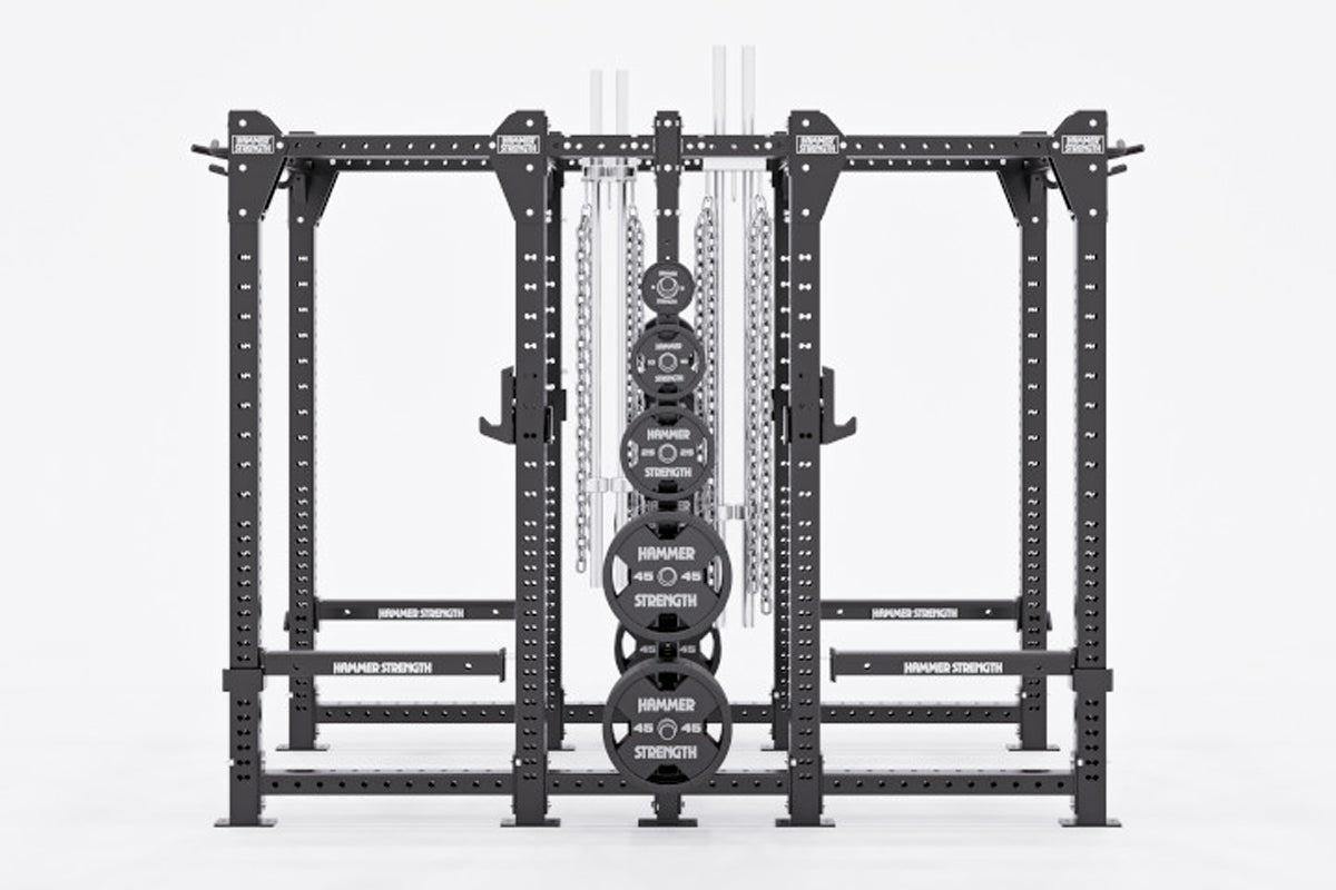Hammer Strength HD Elite ID Combo Rack with black metal frame, weight plates, and chains on white background
