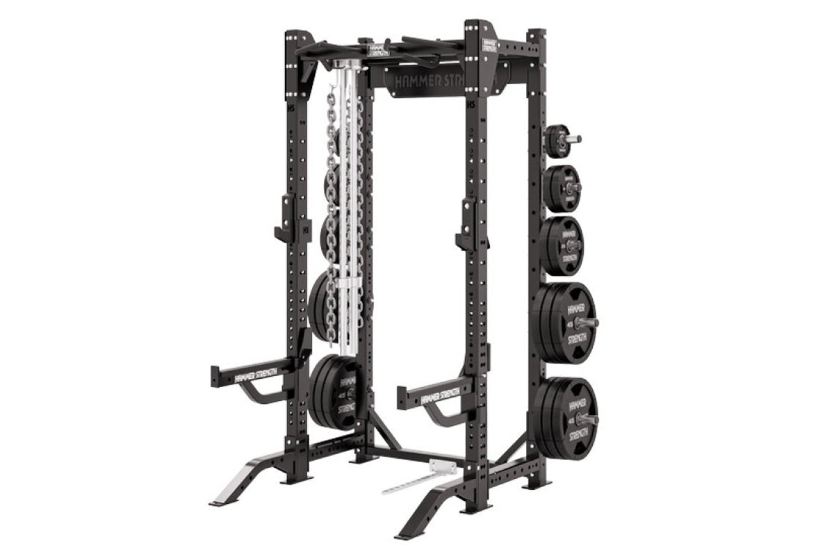 Black Hammer Strength HD Elite ID half rack with perforated steel frame, loaded barbell, weight plates on right side, and saf