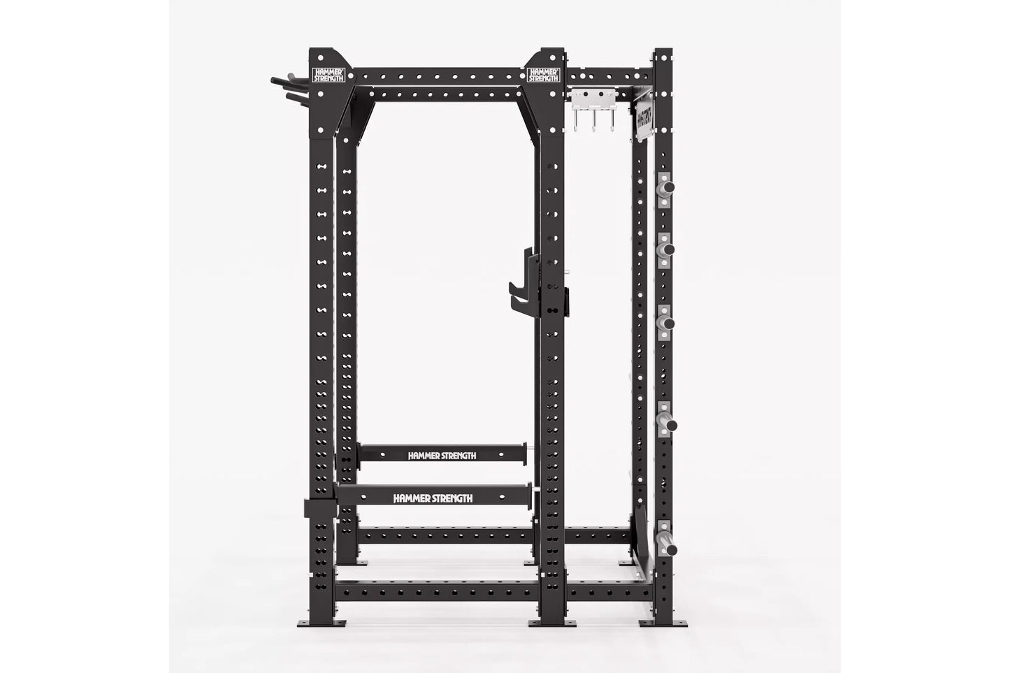Hammer Strength HD Elite ID Power Rack with black steel frame, perforated uprights, white safety bars, and attachment arms on