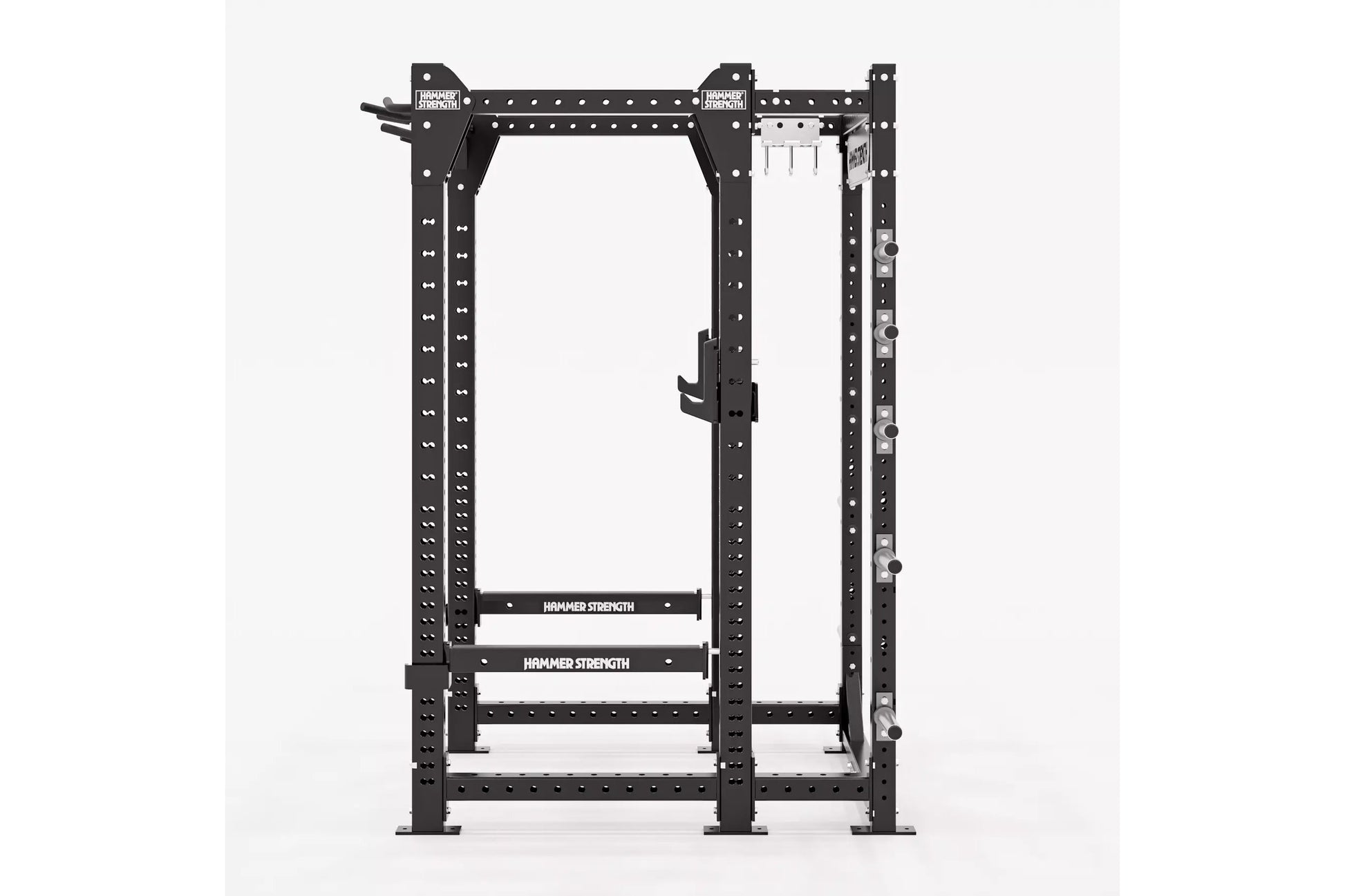 Hammer Strength HD Elite ID Power Rack with black steel frame, perforated uprights, white safety bars, and attachment arms on