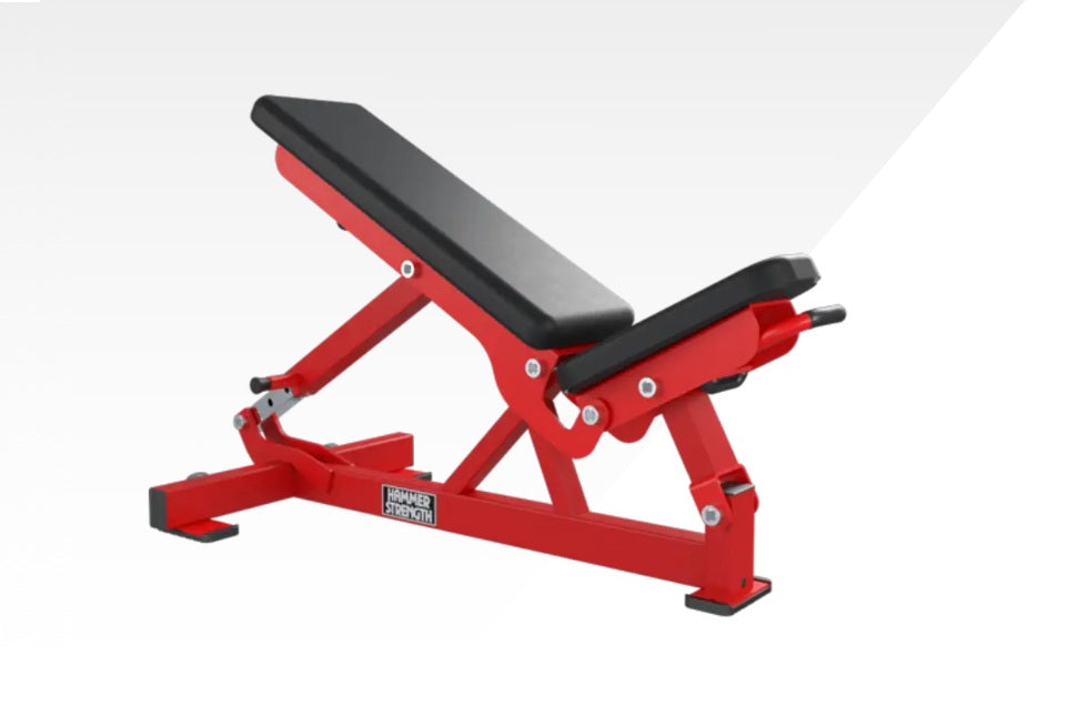 Hammer Strength adjustable weight bench with red frame, black padded seat and backrest, on white background