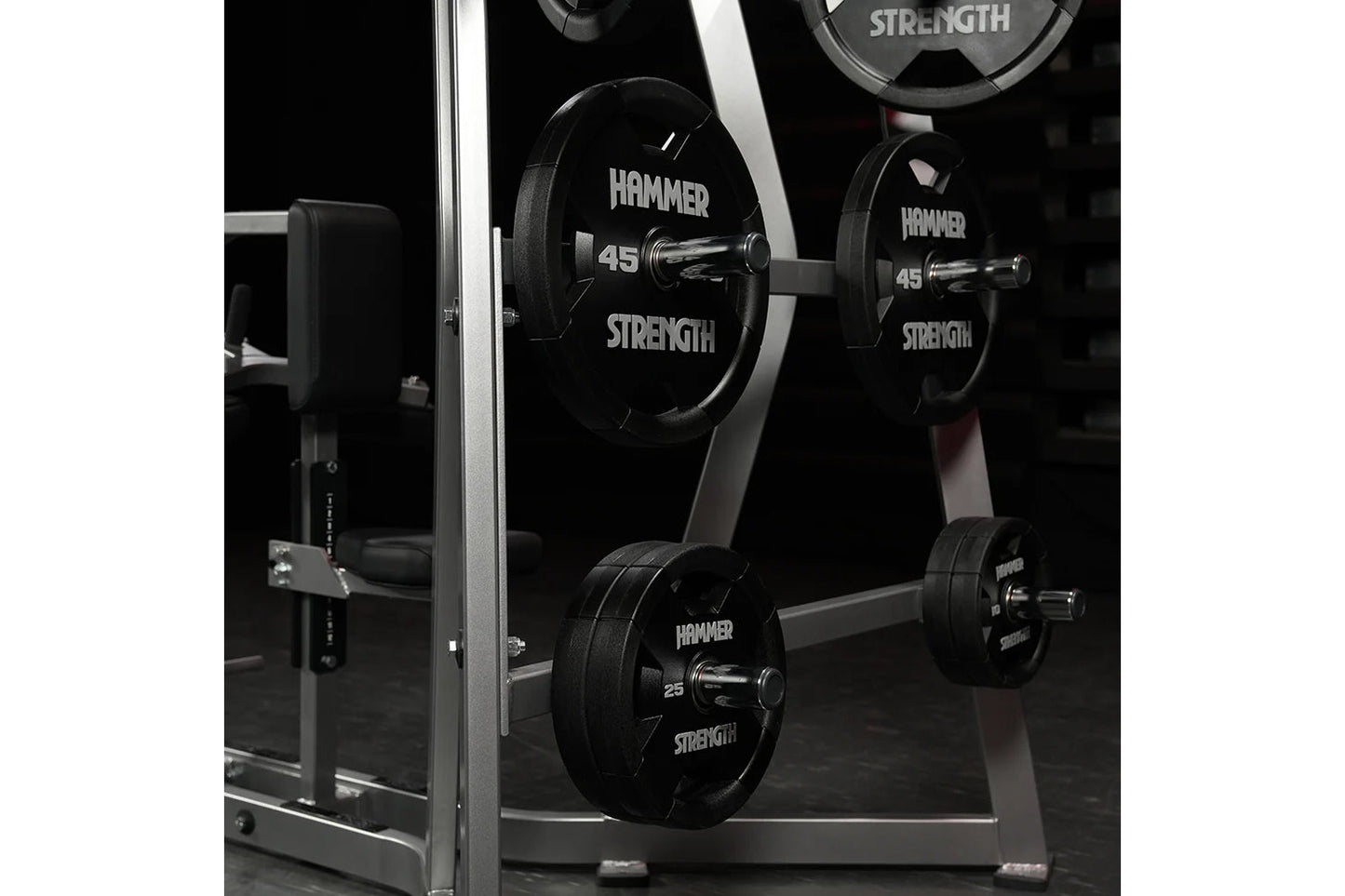 Hammer Strength Iso-Lateral High Row machine with black weight plates labeled 45 and 25 pounds, silver frame, in gym setting