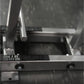 Hammer Strength Iso-Lateral High Row machine with silver metal handles and dark frame on white background
