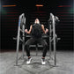 Male athlete using Hammer Strength plate-loaded 4-way neck machine in gym with neon-lit background