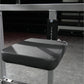 Hammer Strength plate-loaded 4-way neck machine with gray frame, black padded seat, and numbered adjustment dial on white bac