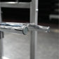 Polished chrome handle bar with gray end cap on Hammer Strength plate-loaded neck machine