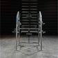 Hammer Strength plate-loaded 4-way neck exercise machine with silver frame and weight plates, front view on gym floor