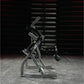 Hammer Strength plate-loaded abdominal oblique crunch machine with black metal frame and seat, displayed in gym setting