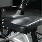 Black leather padded seat with chrome studs on Hammer Strength abdominal machine, detail view