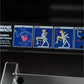 Hammer Strength plate-loaded abdominal crunch machine with instruction decals showing exercise form on blue background
