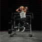 Woman using Hammer Strength plate-loaded abdominal oblique crunch machine in gym, wearing light gray tank top and black leggi