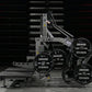 Hammer Strength plate-loaded belt squat machine with gray steel frame, black weight plates labeled 45, and integrated bench o