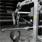Hammer Strength plate-loaded belt squat machine with gray frame, black straps, and chain attachment in gym setting