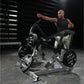 Man in black sleeveless shirt using black and silver Hammer Strength plate-loaded combo twist exercise machine in gym setting