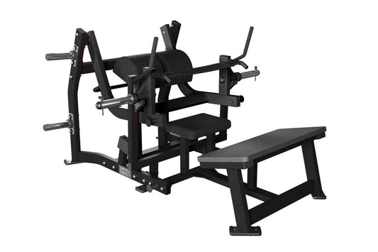 Black plate-loaded glute drive machine with padded seat and backrest, multiple weight plate pegs, and handlebar grips on whit