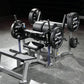 Hammer Strength plate-loaded glute drive machine with black 45-pound weight plates and silver frame on gym floor