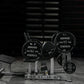Hammer Strength plate-loaded glute drive machine with black weight plates and metal frame in gym setting