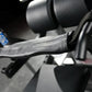 Black and gray lever arm with textured grip on Hammer Strength plate-loaded glute drive machine