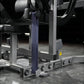 Hammer Strength plate-loaded glute drive machine with blue vertical supports and gray metal frame on gym floor
