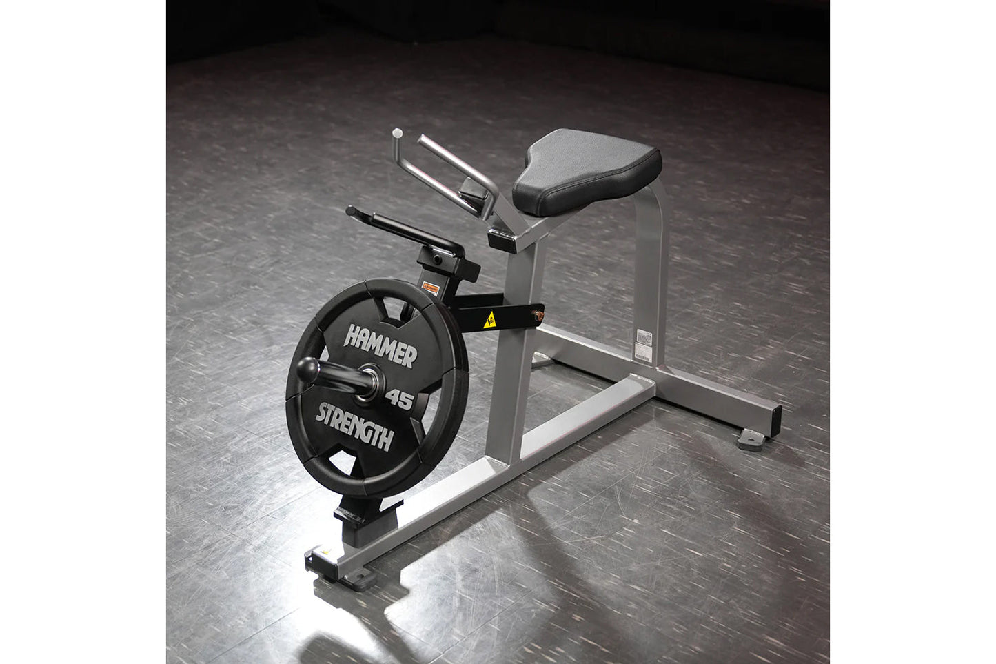 Hammer Strength plate-loaded gripper with 45-pound black weight plate, gray frame, and padded seat on gym floor