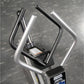 Hammer Strength plate-loaded gripper machine with dual black and silver handles on gray textured background