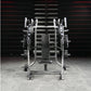 Hammer Strength plate-loaded iso-lateral bench press with white frame, black padded seat, and loaded weight plates in gym set