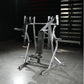 Hammer Strength plate-loaded iso-lateral bench press machine with silver frame and black padded seat in gym setting