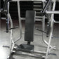 Hammer Strength plate-loaded iso-lateral bench press machine with black padded seat and backrest, silver metal frame, in gym 
