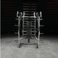 Hammer Strength plate-loaded iso-lateral bench press with chrome and silver frame, black padded seat, and weight plate holder