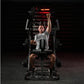 Man wearing gray "Hammer Strength" t-shirt performing chest press exercise on black plate-loaded machine with red neon lights