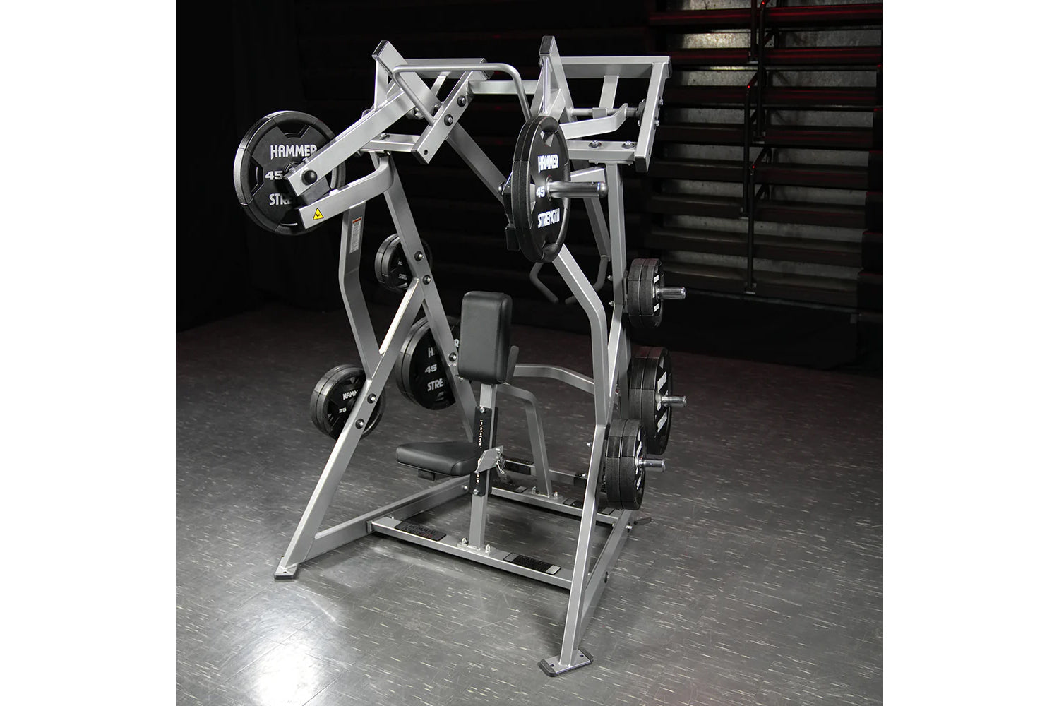 Hammer Strength plate-loaded iso-lateral D.Y. row machine with silver frame and black weight plates on gym floor