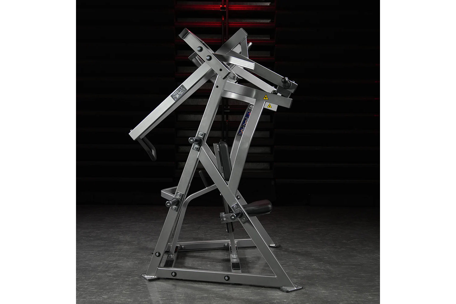 Hammer Strength plate-loaded iso-lateral d.y. row machine with gray steel frame and dual independent arms on black background