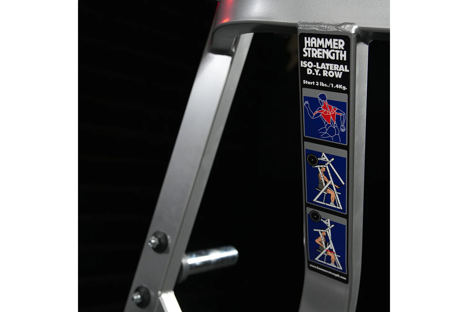 Hammer Strength Iso-Lateral D.Y. Row machine with silver frame and instruction labels on dark background