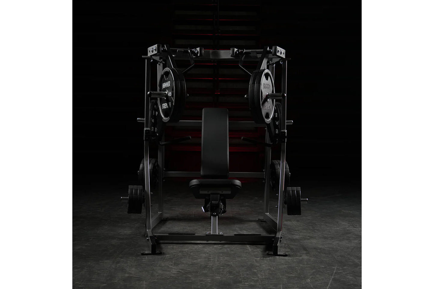 Black Hammer Strength plate-loaded iso-lateral decline chest press with dual weight stack arms and black seat, front view on 