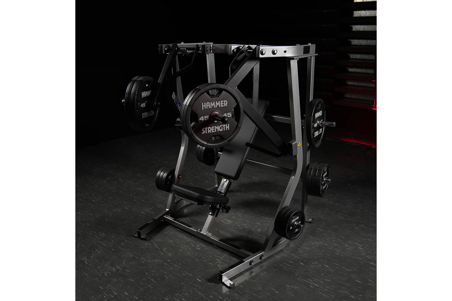 Hammer Strength plate-loaded iso-lateral decline chest press machine with 45-pound weight plates loaded, silver and black fra