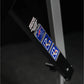 Black nylon strap with white and blue logo patches hanging against dark background