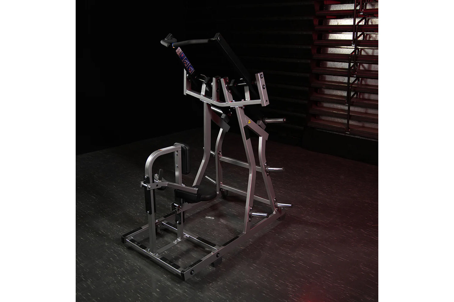 Hammer Strength plate-loaded iso-lateral front lat pulldown machine with burgundy frame and chrome accents in gym setting