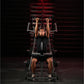 Man using black and red Hammer Strength plate-loaded lat pulldown machine, performing front lat pulldown exercise