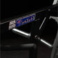 Hammer Strength plate-loaded iso-lateral horizontal bench press with black frame and chrome handles, detail view of machine n