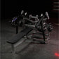 Hammer Strength black plate-loaded iso-lateral horizontal bench press with dual foot pedals, on dark gym floor