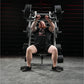 Man wearing black t-shirt performing incline chest press on Hammer Strength plate-loaded machine with black weight plates in 
