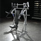 Hammer Strength silver and black plate-loaded iso-lateral incline press with padded seat in gym setting