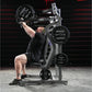 Hammer Strength plate-loaded iso-lateral incline press machine with weighted plates, demonstrated by user in black shirt perf