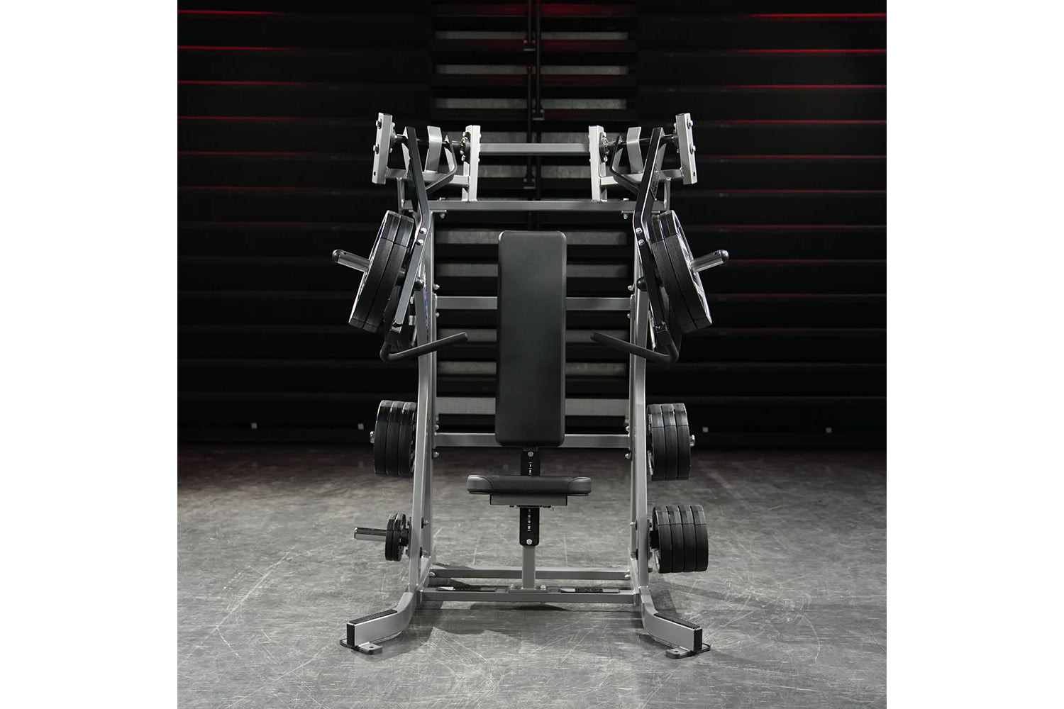 Hammer Strength plate-loaded iso-lateral incline press with silver frame, black padded seat and handles, loaded weight plates