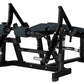 Black plate-loaded leg curl machine with dual padded footrests, adjustable seat, and metal frame on white background